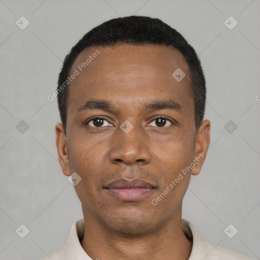 Neutral latino young-adult male with short  black hair and brown eyes
