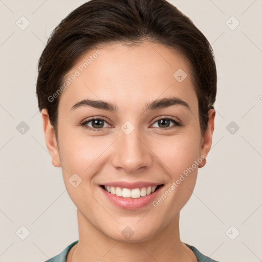 Joyful white young-adult female with short  brown hair and brown eyes