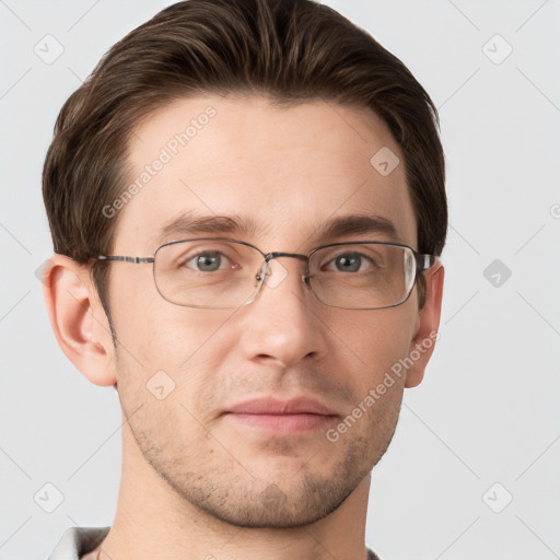 Joyful white adult male with short  brown hair and grey eyes