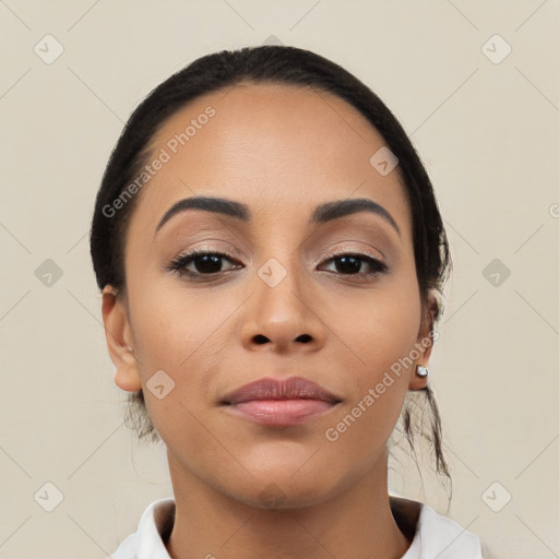 Joyful white young-adult female with medium  black hair and brown eyes