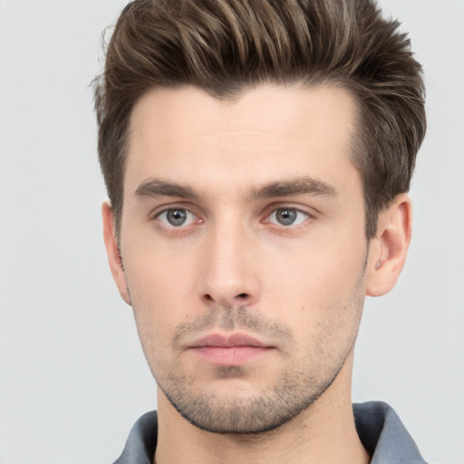 Neutral white young-adult male with short  brown hair and brown eyes