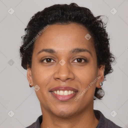 Joyful black young-adult female with medium  brown hair and brown eyes