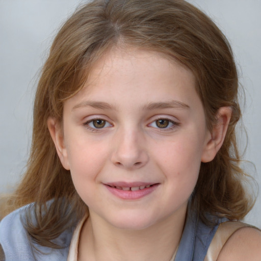 Joyful white child female with medium  brown hair and blue eyes