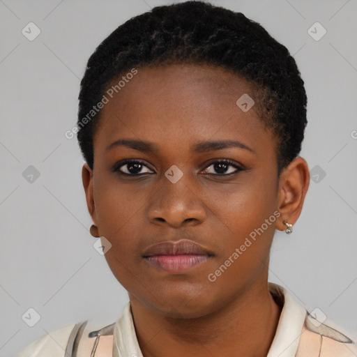 Neutral black young-adult female with short  brown hair and brown eyes