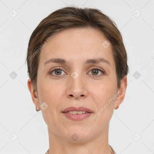 Joyful white adult female with short  brown hair and brown eyes