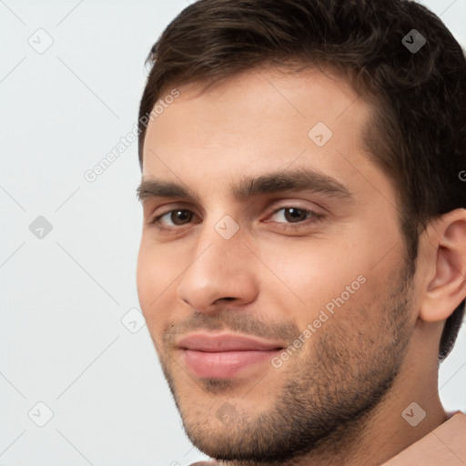 Neutral white young-adult male with short  brown hair and brown eyes