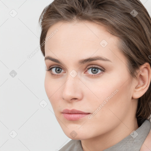 Neutral white young-adult female with medium  brown hair and grey eyes