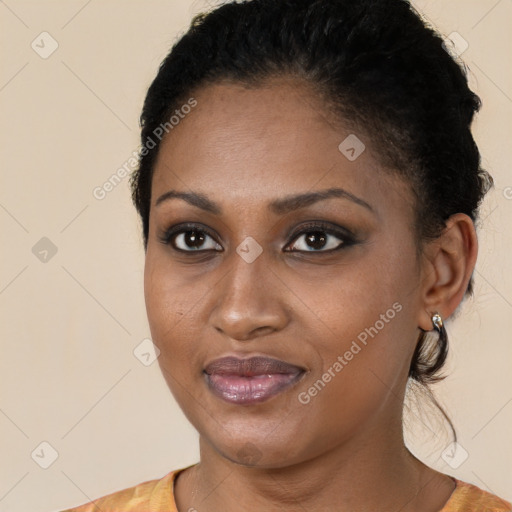 Joyful black young-adult female with medium  black hair and brown eyes