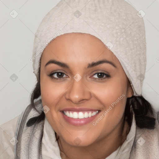 Joyful white young-adult female with long  black hair and brown eyes