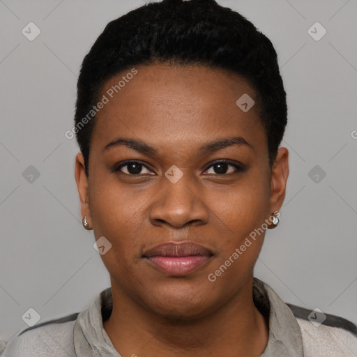 Joyful black young-adult female with short  black hair and brown eyes