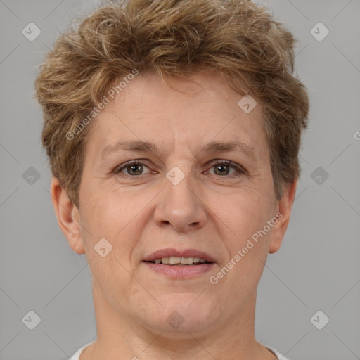 Joyful white adult female with short  brown hair and brown eyes