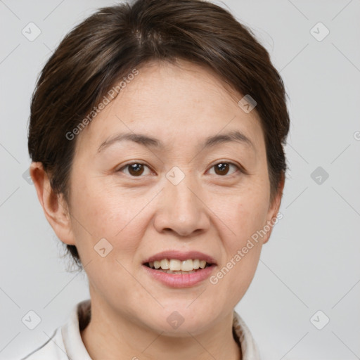 Joyful white adult female with short  brown hair and brown eyes