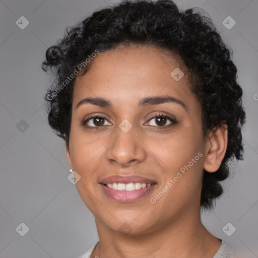 Joyful latino young-adult female with short  black hair and brown eyes