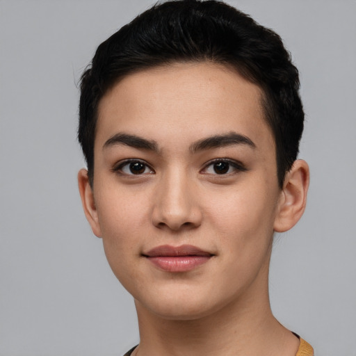Joyful white young-adult female with short  black hair and brown eyes