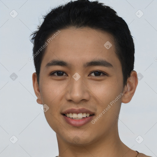 Joyful asian young-adult male with short  black hair and brown eyes