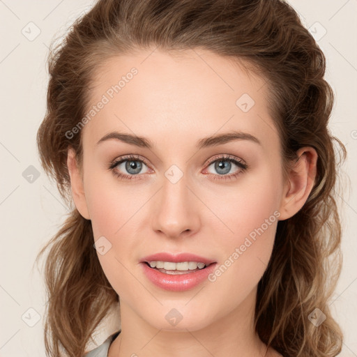 Joyful white young-adult female with long  brown hair and blue eyes