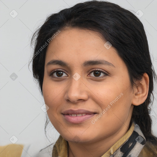 Joyful latino young-adult female with medium  brown hair and brown eyes