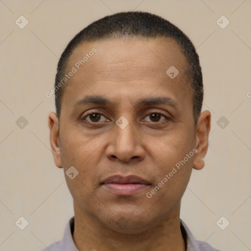 Neutral latino adult male with short  black hair and brown eyes