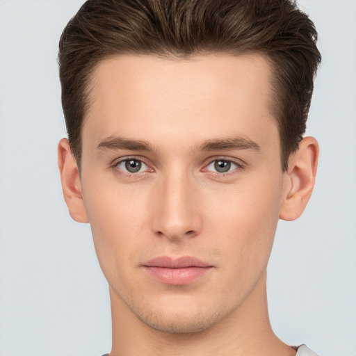 Neutral white young-adult male with short  brown hair and brown eyes