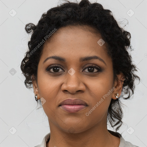 Joyful black young-adult female with medium  black hair and brown eyes