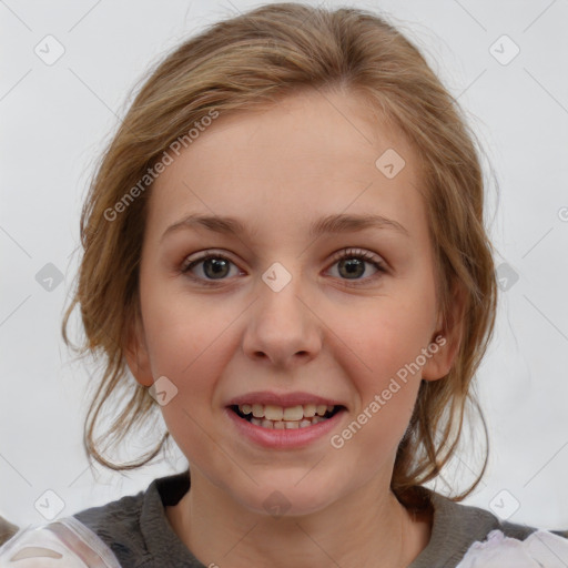 Joyful white young-adult female with medium  brown hair and blue eyes