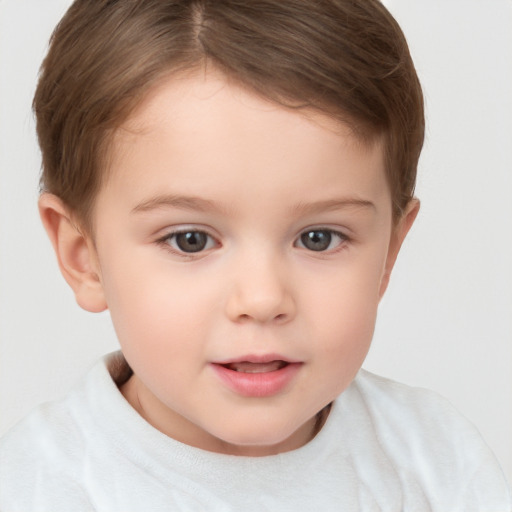 Joyful white child female with short  brown hair and brown eyes