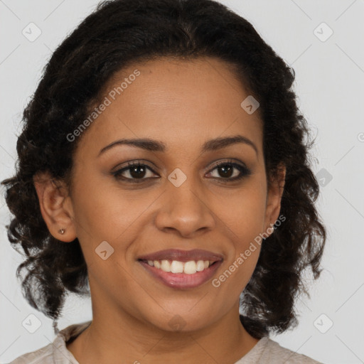 Joyful black young-adult female with medium  brown hair and brown eyes