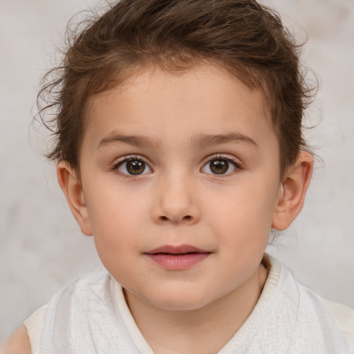 Joyful white child female with short  brown hair and brown eyes