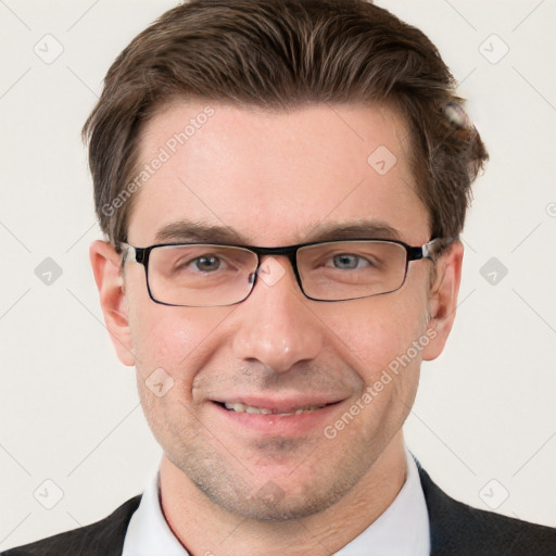 Joyful white adult male with short  brown hair and grey eyes