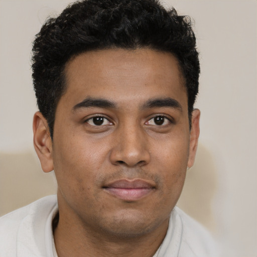 Neutral latino young-adult male with short  brown hair and brown eyes