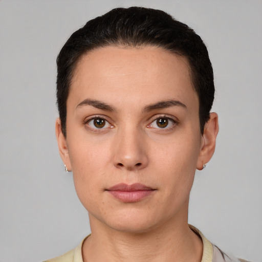 Neutral white young-adult female with short  black hair and brown eyes