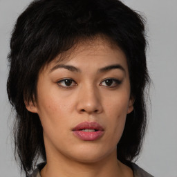 Neutral asian young-adult female with medium  brown hair and brown eyes