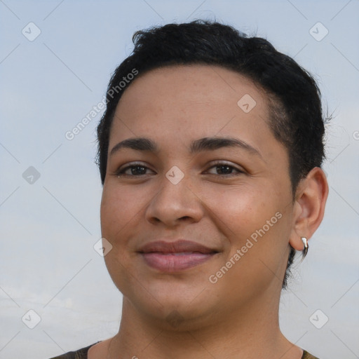 Joyful latino young-adult female with short  brown hair and brown eyes