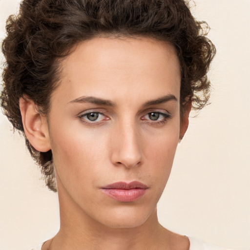 Neutral white young-adult female with short  brown hair and brown eyes