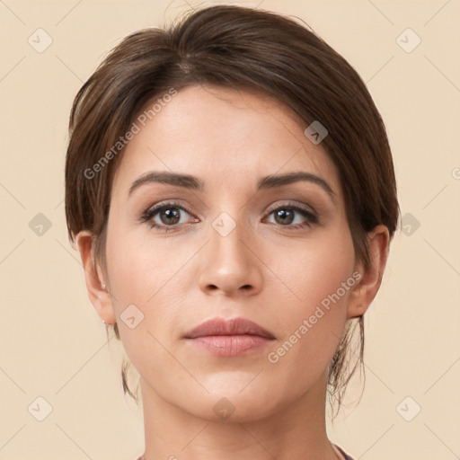 Neutral white young-adult female with short  brown hair and brown eyes