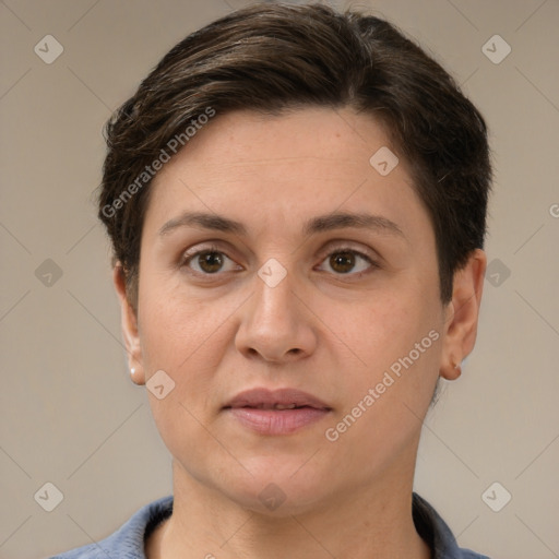 Joyful white adult female with short  brown hair and brown eyes