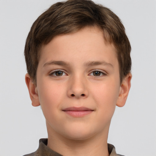 Joyful white child male with short  brown hair and brown eyes