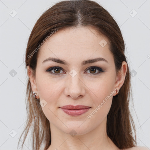 Joyful white young-adult female with long  brown hair and grey eyes