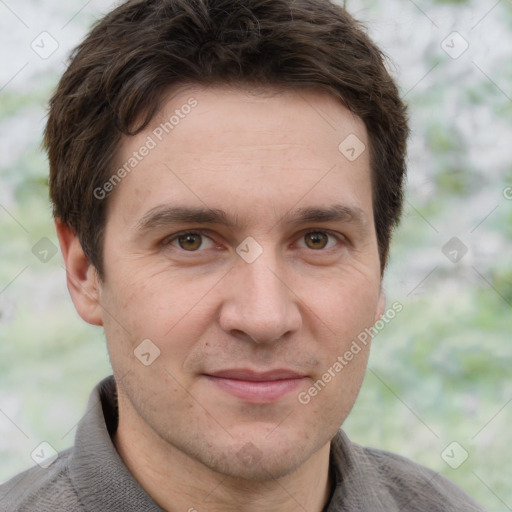 Joyful white adult male with short  brown hair and grey eyes