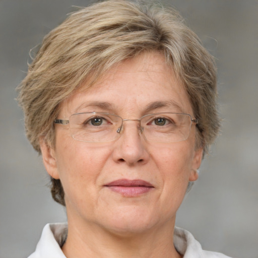 Joyful white middle-aged female with medium  brown hair and brown eyes