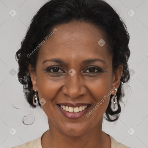 Joyful latino adult female with medium  brown hair and brown eyes