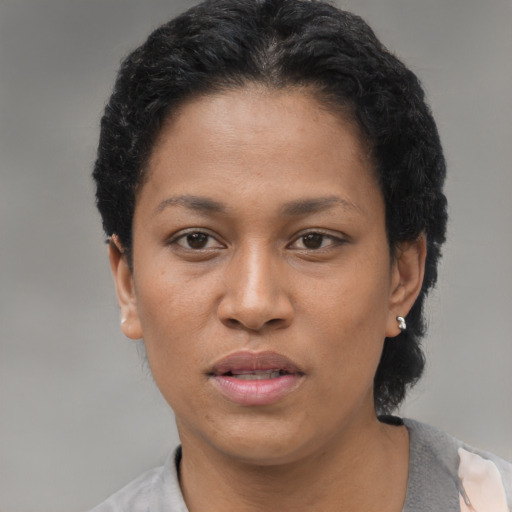 Neutral latino young-adult female with short  black hair and brown eyes