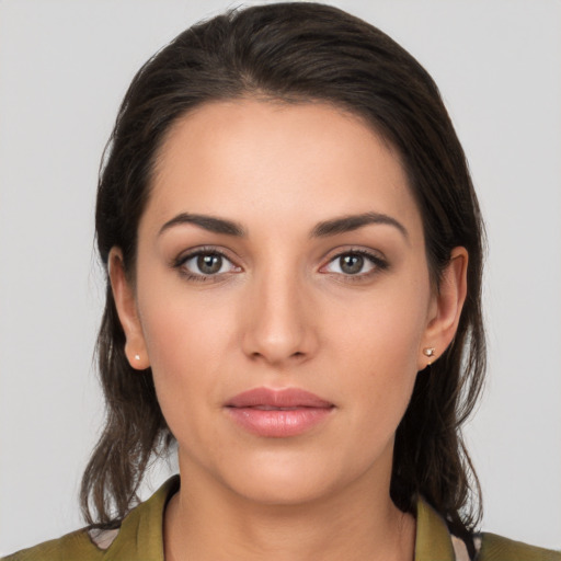 Neutral white young-adult female with medium  brown hair and brown eyes