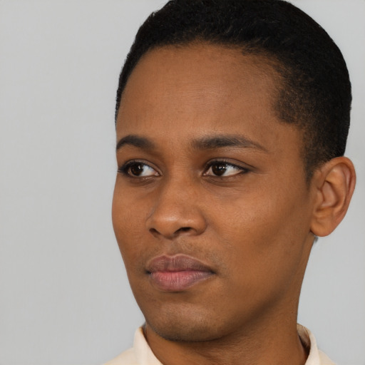 Neutral black young-adult female with short  black hair and brown eyes