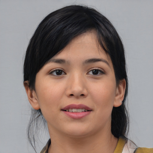 Joyful asian young-adult female with medium  black hair and brown eyes