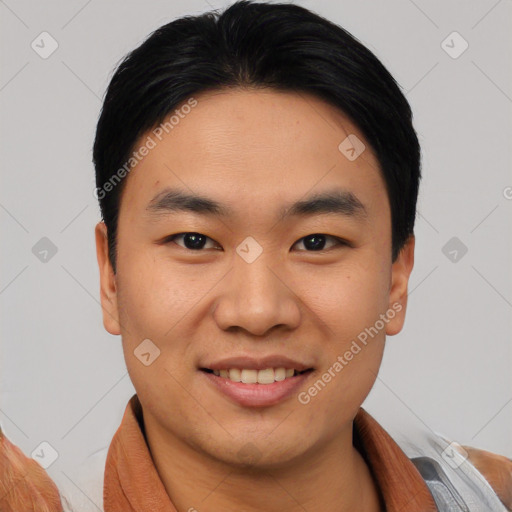 Joyful asian young-adult male with short  black hair and brown eyes