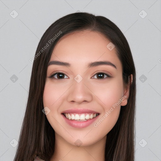 Joyful white young-adult female with long  black hair and brown eyes