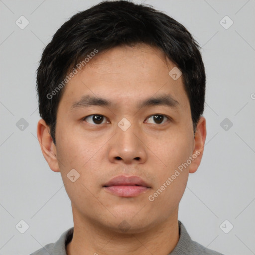 Neutral asian young-adult male with short  black hair and brown eyes