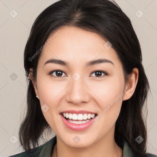 Joyful white young-adult female with long  brown hair and brown eyes