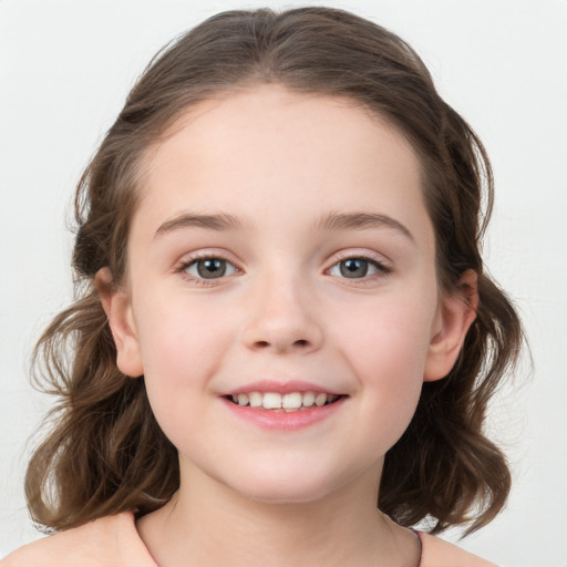 Joyful white child female with medium  brown hair and grey eyes